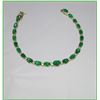 Image 1 : Elegant Emerald and Diamond Bracelet  featuring 21 oval cut graduated emera