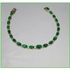Image 3 : Elegant Emerald and Diamond Bracelet  featuring 21 oval cut graduated emera