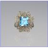 Image 1 : Antique Victorian Blue Topaz and Diamond  Flower Ring featuring a 7.25 cara