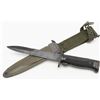 Image 1 : U.S. M8A1 bayonet with sheath and woven  hanger in fine condition.    Est.: