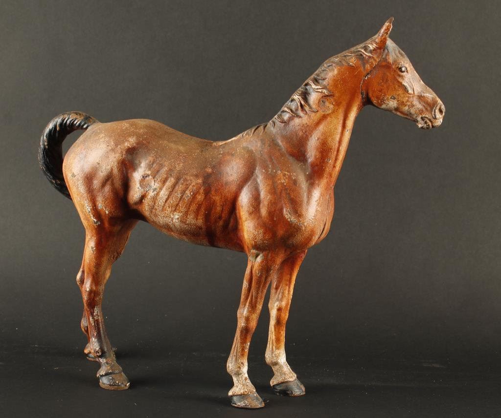 Antique castiron doorstop of horse pre1930s. Est. 300600