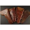 Lot of 4 Western style leathe3r holsters;  various conditions.    Est.:  $1