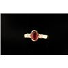 Image 1 : One 14k yellow gold ladies ring with set with  a very fine ruby weighing ap