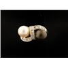 Image 1 : One deco ladies bypass ring set with a white  pearl  a black pearl and diam