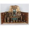 Image 1 : Modell-Apotheke. Trapezförmiges Eichenholzgestell. Hochgezogene, seitlich eingeschwungene, mit Me...