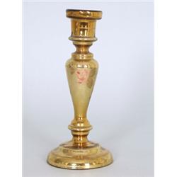 Kerzenleuchter. Mundgeblasenes Glas, im Inneren vergoldet. Balusterform, Reste von farbiger Blum...