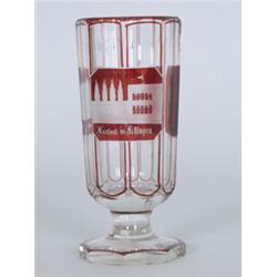 Pokal. Farbloses Glas, teilweise rubinrot lasiert. Achtkantiger Stand, kurzer Schaft. Auf der fa...