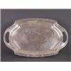 Image 1 : Tablett. Ovale Form mit Griffen. Breiter Profilrand. Stempel Sterling. L: 41,5 cm....