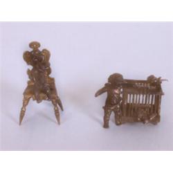 Konvolut. Miniaturgruppen. Putto beim Öffnen eines Vogelkäfigs. Stempel 800. Dazu Schellen schla...