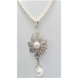 Pendant Gross wt 83.07gr, Gold wt 4.1gr , Silver wt 76.42gr Diamond wt 12.75cts, Gross wt. 67.62gr,