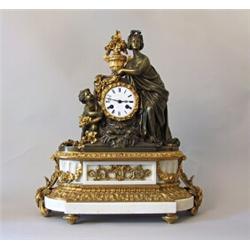 Mantle clock, Gilded and patinated bronze, signed R Amic Paris, height 54 cm; pendulum missing...