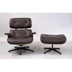 Lounge chair and ottoman, Palisanderplywood and darkbrown leather, designed byCharles och Ray E...