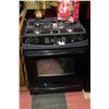 Image 1 : GAS TOP SLIDE IN 5 BURNER CONVECTION OVEN