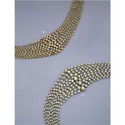 A NATURAL GOLDEN PEARL NECKLACE, Composed of eleven graduated rows of natural golden coloured pea...