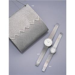 OMEGA, A LADIES DIAMOND SET DRESS WATCH, The oval silver coloured dial within a two row brilliant...