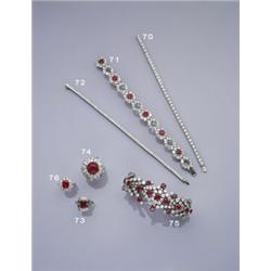 A RUBY AND DIAMOND BRACELET CA 1960, The lozenge shaped cluster centre set with brilliant and bag...