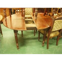 Continental oval extending dining table on turned and fluted legs, original castors, no leaves…