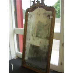 Large ornate gilded pier mirror with bevelled glass…