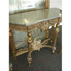 Gilt console table with shaped marble top…