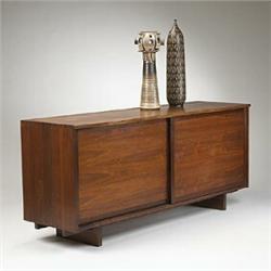 George Nakashima, Sliding Door Cabinet, USA, 1970, walnut, 71"w x 21"d x 31"h, Two door...