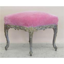 LOUIS XV CARVED AND GILTWOOD STOOL, French. 18th Century. Of lozenge form, two sides carved wit...