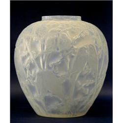 R. LALIQUE MOLDED OPALESCENT "PERRUCHES" VASE, French. Circa 1920. Engraved R. Lalique. Height...