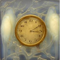 R. LALIQUE MOLDED AND FROSTED PARTIAL OPALESCENT "INSEPARABLES" CLOCK, French. Circa 1935. Mold...