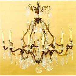 VERY FINE LOUIS XV STYLE GILT BRONZE, ROCK CRYSTAL AND GLASS TWELVE LIGHT CHANDELIER, French. 1...