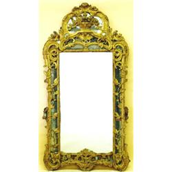 GOOD LOUIS XV CARVED AND GILTWOOD MIRROR, French. 18th Century. The divided mirror plate enclos...
