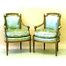 FINE PAIR OF LOUIS XVI GILTWOOD FAUTEUILS, French. 18th Century. Each curved top rail flanked b...