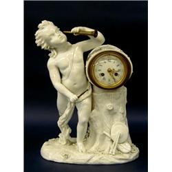 SCHIERHOLZ BLANC DE CHINE PORCELAIN FIGURAL MANTEL CLOCK, German. 1880-1906. The clock housed i...