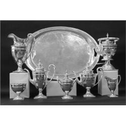 EIGHT PIECE STERLING SILVER TEA AND COFFEE SERVICE, American. Date mark for 1928. Maker: Domini...
