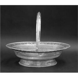 GEORGE III STERLING SILVER CAKE BASKET, English. London. 1777. Maker: W.P. Of oval shape with p...
