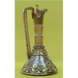 HAND BLOWN AND ENAMELED DECANTER, Italian. 20th Century. The conical shape body with deer and f...