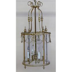 LOUIS XV STYLE GILT BRONZE LANTERN, 20th Century. Of cylindrical form set with four glass panel...