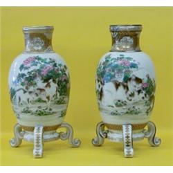 GOOD PAIR OF KUTANI PORCELAIN VASES, Japanese. 19th Century. Signed. Each finely enameled with...