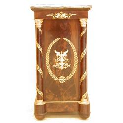 EMPIRE STYLE GILT BRONZE MOUNTED MAHOGANY PEDESTAL CABINET, French. Late 19th Century. The gray...
