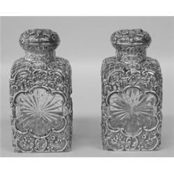 FINE PAIR OF VICTORIAN STERLING SILVER MOUNTED COLOGNE SCENT BOTTLES, English. London. 1894. Ma...