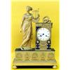 Image 1 : EMPIRE ORMOLU MANTEL CLOCK, French. Dated 1818. The circular white enamel dial inscribed Robin...