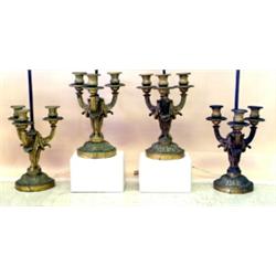 RARE AND VERY FINE SET OF FOUR EMPIRE STYLE GILT BRONZE THREE LIGHT CANDELABRA, French. 19th Ce...
