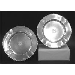 SET OF TWELVE TIFFANY & CO. STERLING SILVER SALAD PLATES, American. 1891-1902. Each centered by...