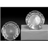 Image 1 : SET OF TWELVE TIFFANY & CO. STERLING SILVER BUTTER PLATES, American. 1891-1902. Each centered b...