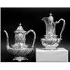 Image 1 : TIFFANY & CO. STERLING SILVER COFFEE POT AND HOT MILK JUG, American. 1891-1902. Each with wavy...
