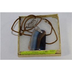 HANDCRAFTED ONYX AGATE TRAPEZOID PENDANT ON SILK