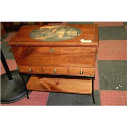 WOODEN STORAGE CHEST ON WROUGHT IRON BASE WITH