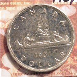 1951 Canada Silver Dollar. 3 water lines. AU.