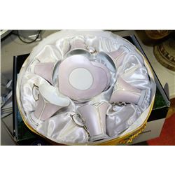 TEACUP AND SAUCER SET