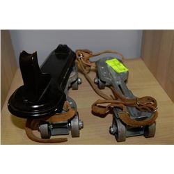 PAIR OF VINTAGE ROLLER SKATES