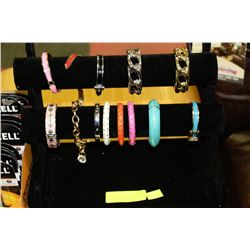 LARGE COLLECTION OF BRACELETS WITH JEWELLERY STAND