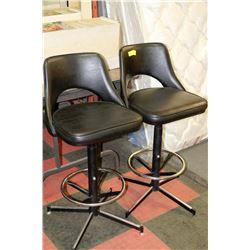 PAIR OF BLACK LEATHERETTE SWIVEL BAR STOOLS